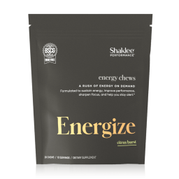 A black resealable pouch labeled "Shaklee Performance Energy Chews" in citrus burst flavor, with Shaklee Energy Chews product and benefit descriptions printed on the front.
