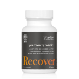 White bottle labeled “Shaklee Performance pm recovery complex Recover,” a dietary supplement from Shaklee Sports Nutrition with 60 capsules for alleviating post-workout muscle soreness.